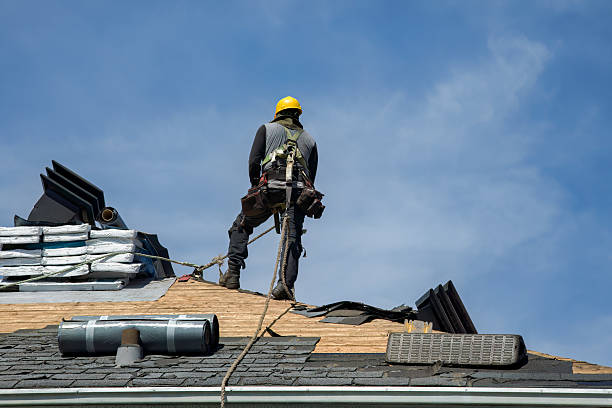 Professional Roof Replacement technician working in Marstons Mills, MA
